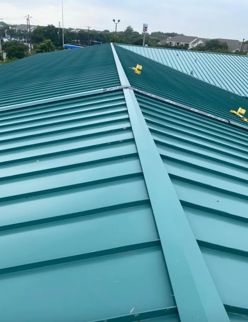 Green commercial metal roof ridge and valley for Metal Roof Repair in Kirkland